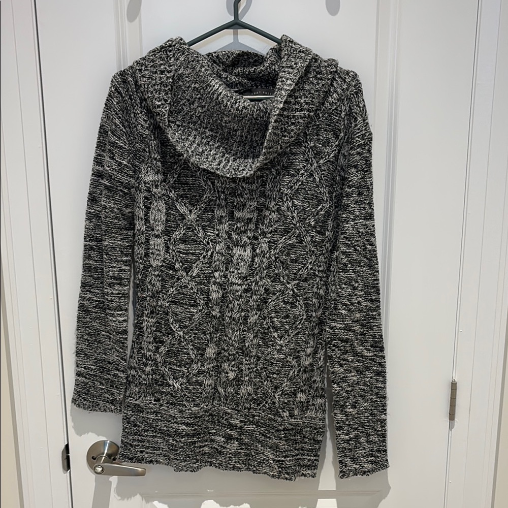 Cowl neck sweater, extends to under hip